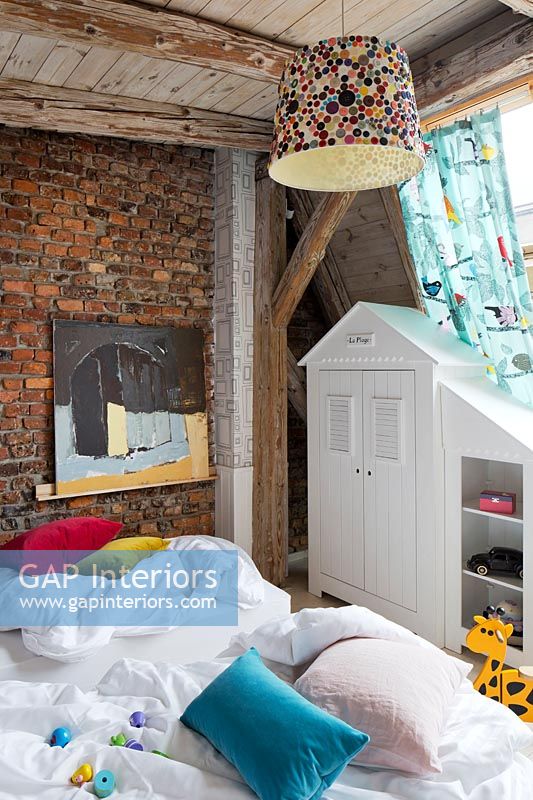 Childrens bedroom with exposed beams