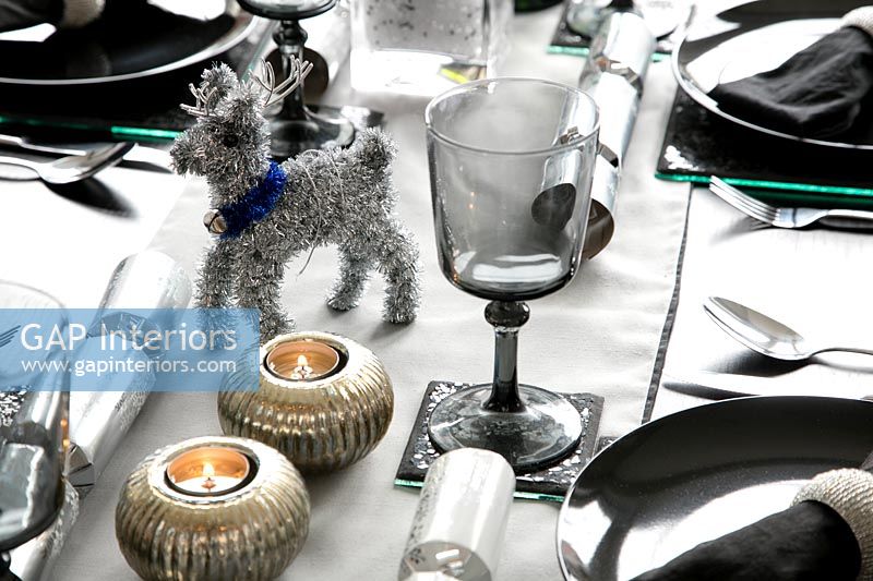 Detail of reindeer decoration on dining table
