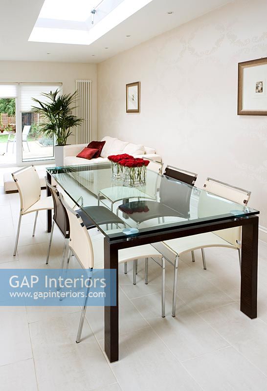 Modern glass topped dining table
