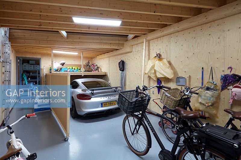 Garage with car and bicycles 