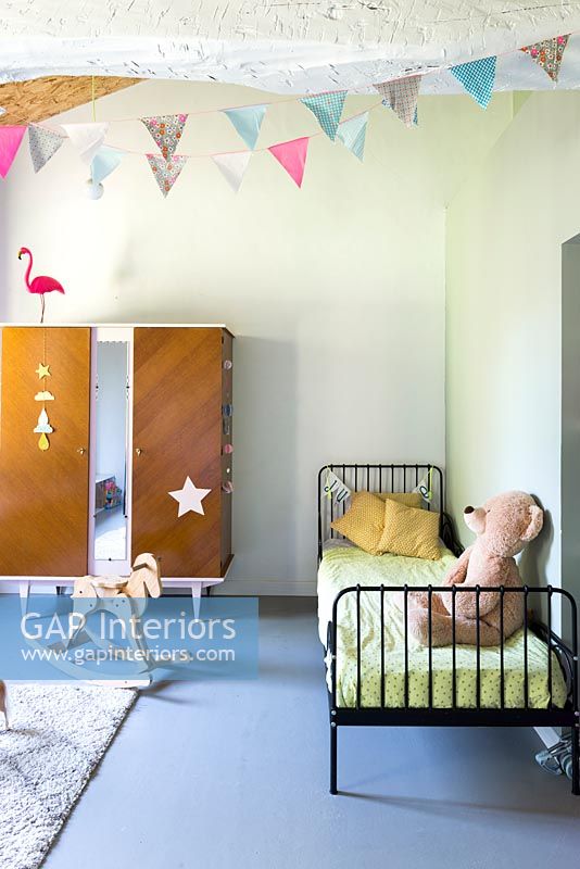 Iron daybed in children's room 
