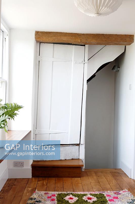 Small white internal door on landing of country house 