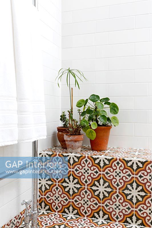 Patterned tiles detail in classic bathroom 