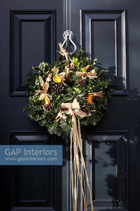 Exterior of front door with Christmas wreath 