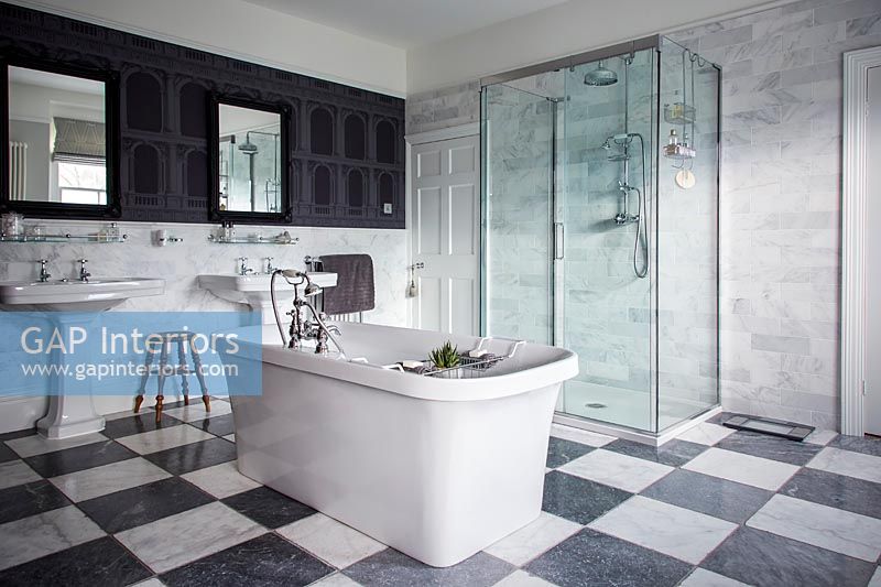 Classic bathroom with freestanding bath and shower enclosure 