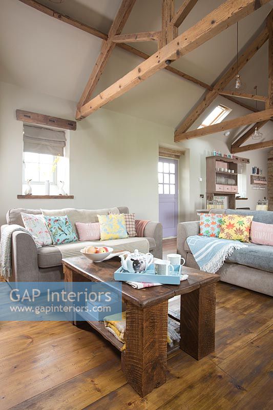 Country living room with pastel coloured soft furnishings