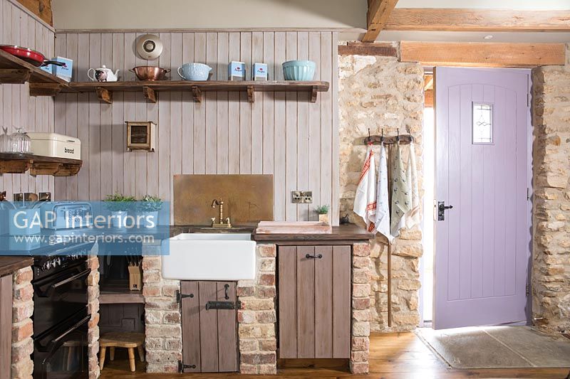 Lilac painted door in country kitchen 