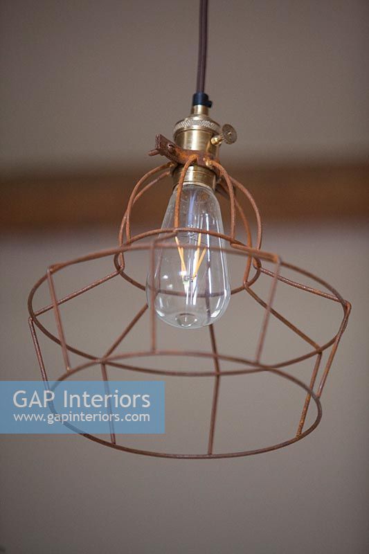 Pendant light with lampshade frame 