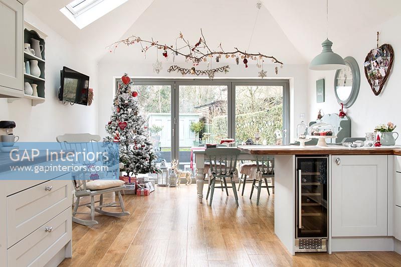 Open plan kitchen diner decorated for Christmas 