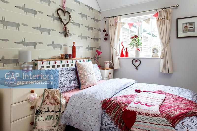 Colourful bedroom decorated for Christmas 