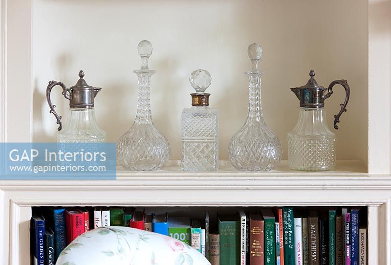 Collection of glassware on shelf 