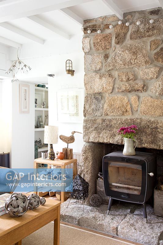Cottage with fireplace - exposed stone chimney breast 