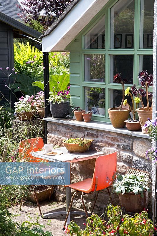 Small table in cottage garden 