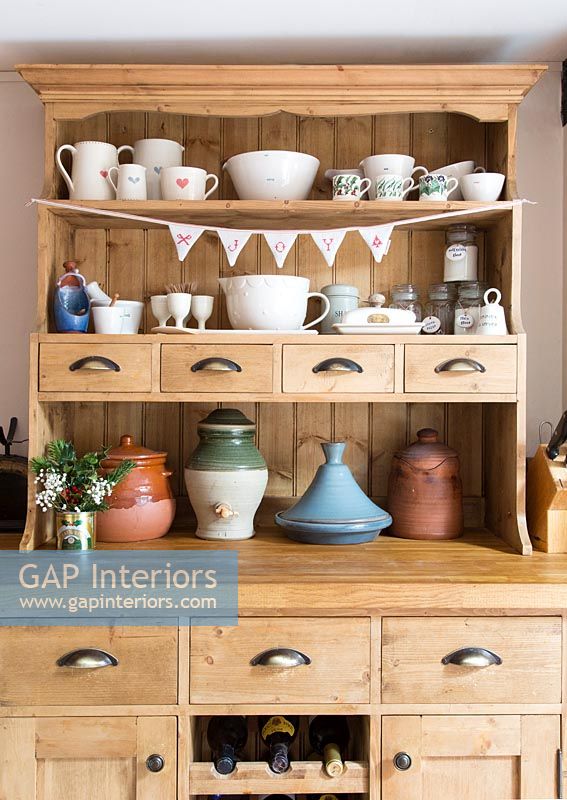 Bunting on traditional country wooden dresser 
