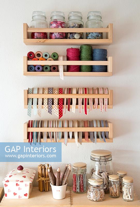 Shelves of sewing equipment, thread and ribbon 