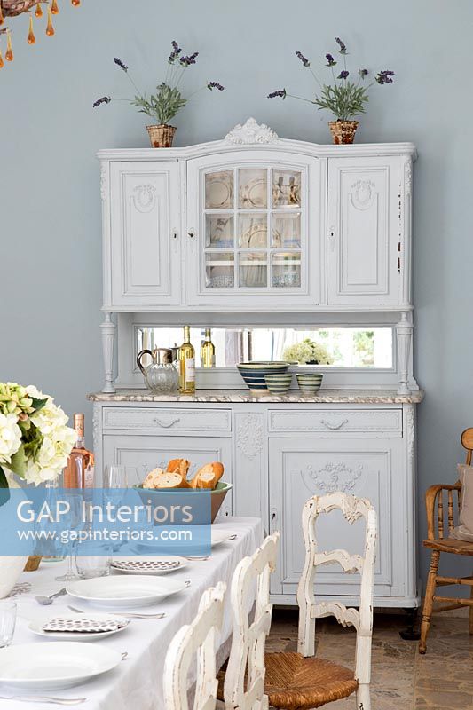 Painted dresser in country style dining room 