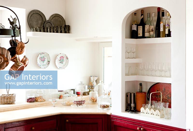 Country kitchen with alcove shelving 