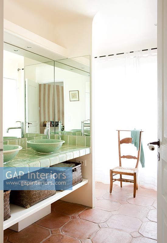 Mint green bowl sinks in country bathroom 