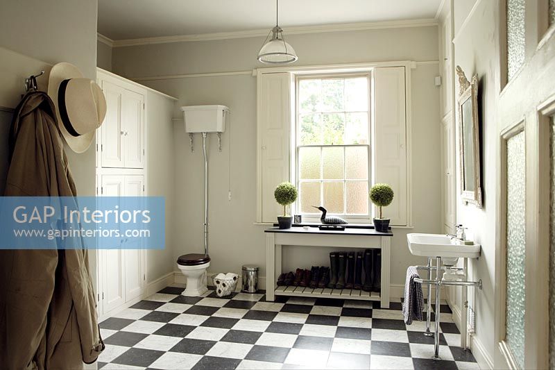 Classic bathroom with black and white checked floor 
