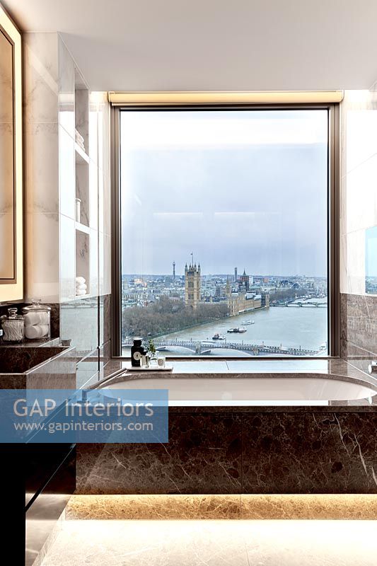 Modern bathroom with views to Houses of Parliament on River Thames 