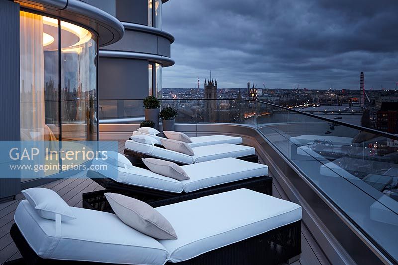 Modern roof terrace at night