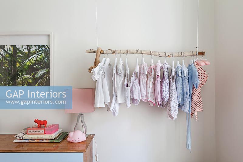 Homemade clothes rail for baby clothes 