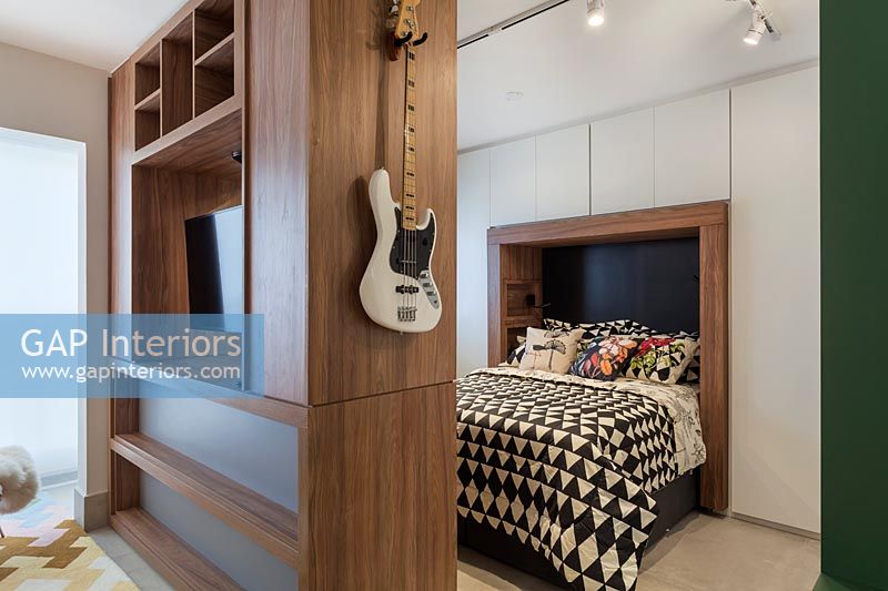 Modern bedroom with built in wardrobes and partition wall 