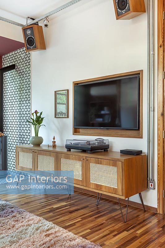 Wooden sideboard in modern industrial living room 
