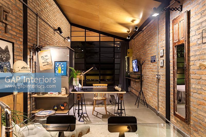 View of small open plan industrial style apartment 