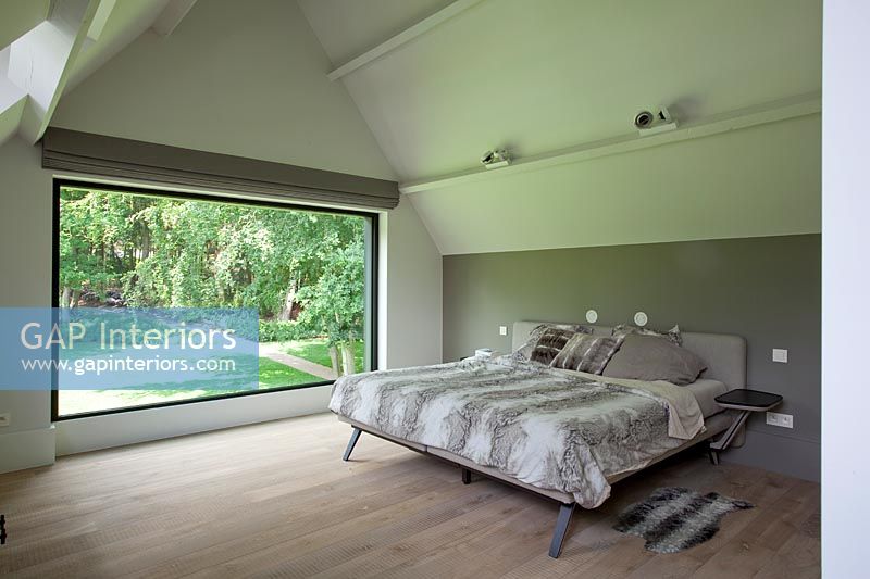 Modern bedroom with garden view