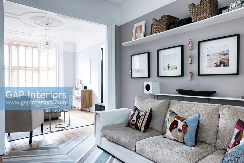 Modern living room with painted grey walls 