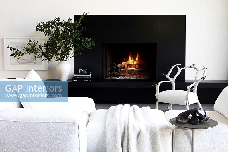 Modern white living with fireplace 