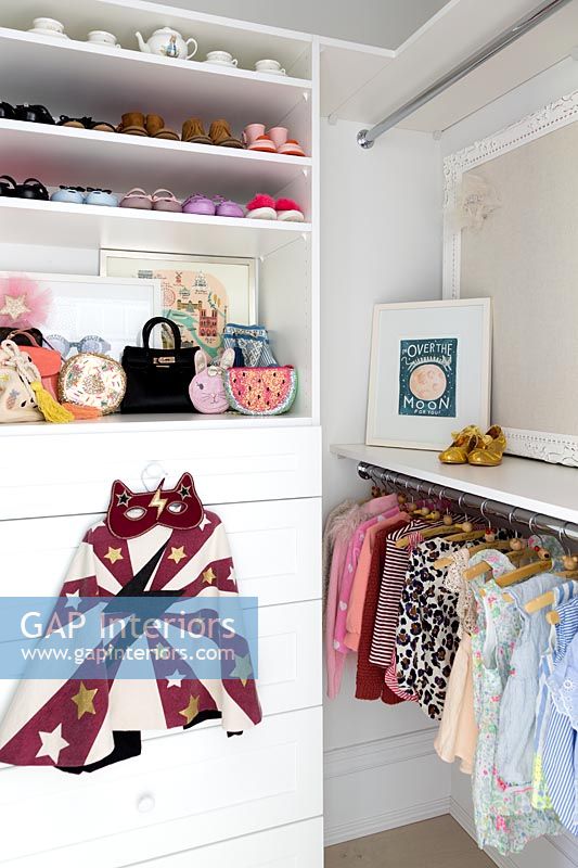 Wardrobe and chest of drawers in childrens room 