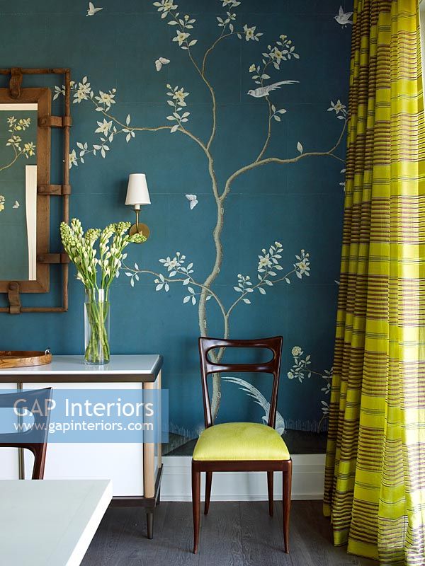 Blue and white floral wallpaper in modern dining room 