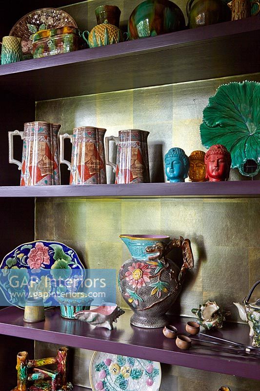 Eclectic display of jugs and ornaments 