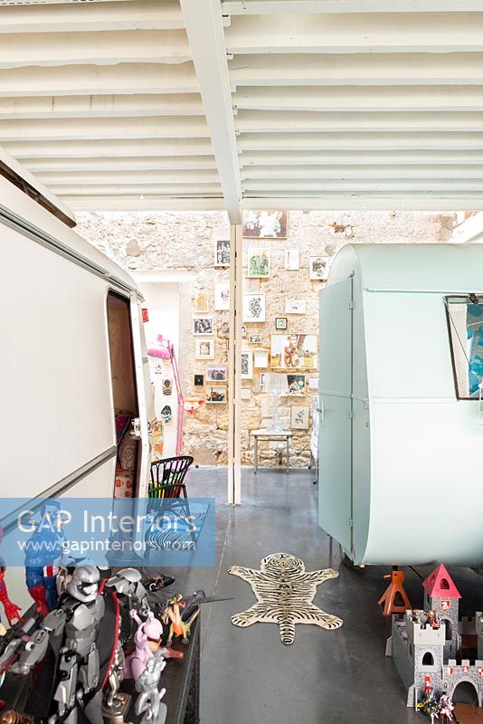 Vintage caravans inside industrial home - childrens room 