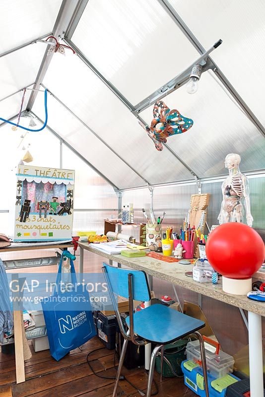 Childrens play room - workshop inside greenhouse 