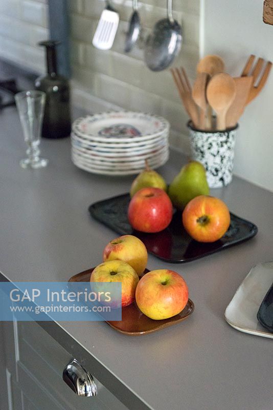 Apples displayed in kitchen