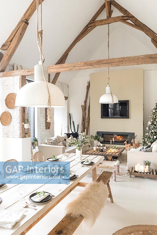 Modern country open plan living and dining room at Christmas time 