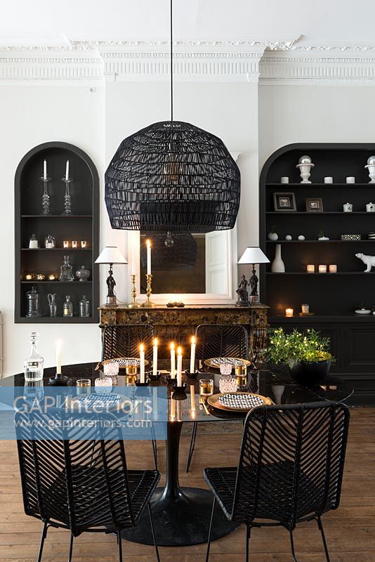 Monochrome modern dining room with period details 