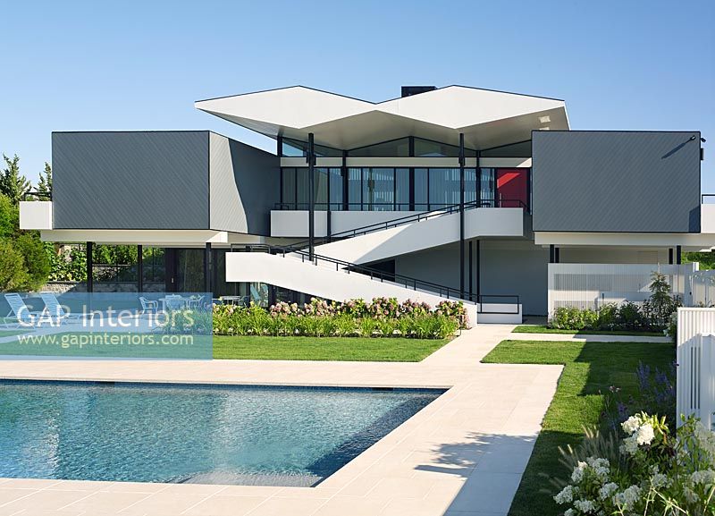Modern house exterior with swimming pool 