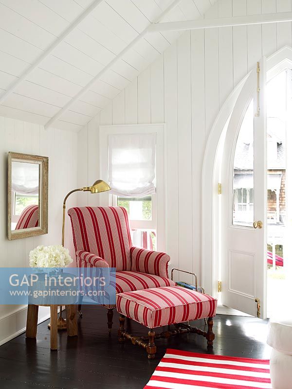 Armchair in white living room 