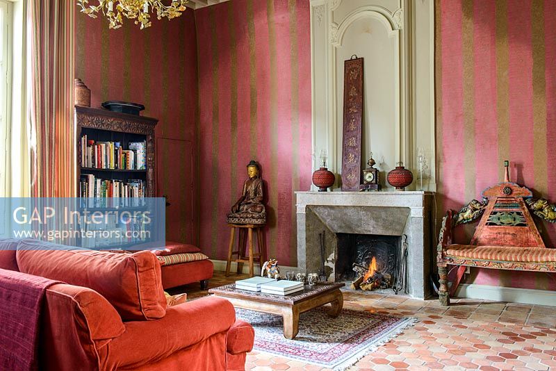 Classic living room with red wallpaper 