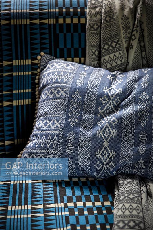 Close up blue patterned cushion 