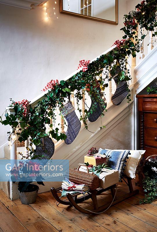 Country staircase decorated for Christmas