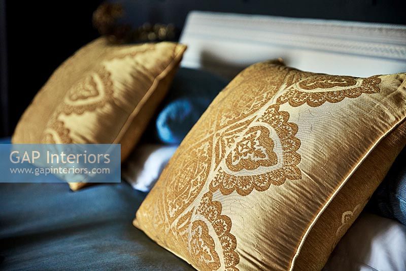 Gold cushions close up 
