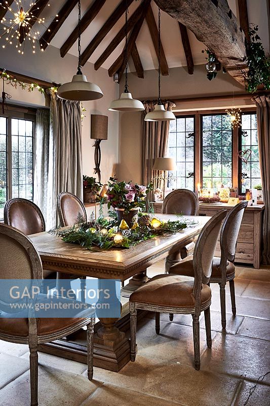 Country dining room with Christmas centrepiece 