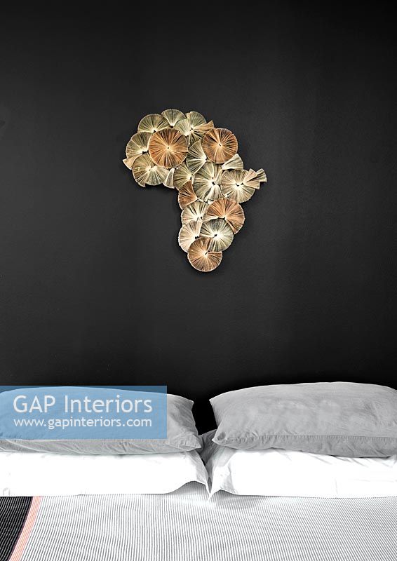 Textured Africa artwork above bed 