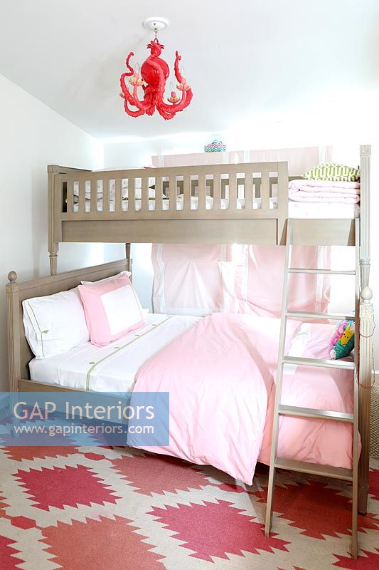 Bunk bed with ladder in modern childrens room 