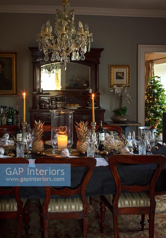 Traditional dining room dressed for Christmas dinner 